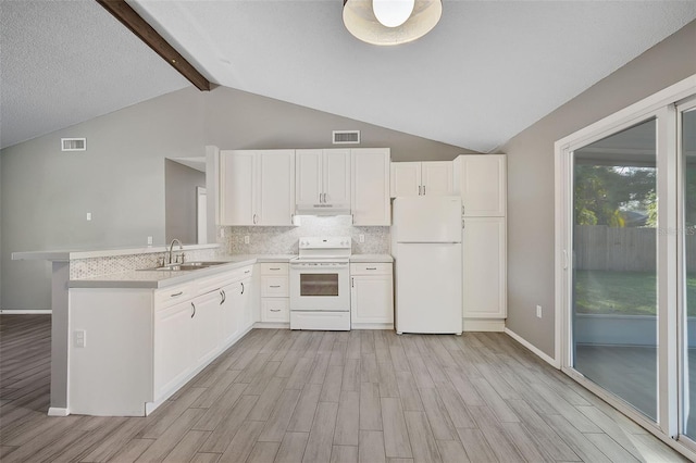 kitchen with sink, white appliances, light hardwood / wood-style flooring, white cabinetry, and kitchen peninsula