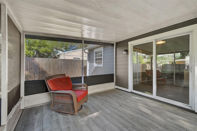 sunroom with wooden ceiling