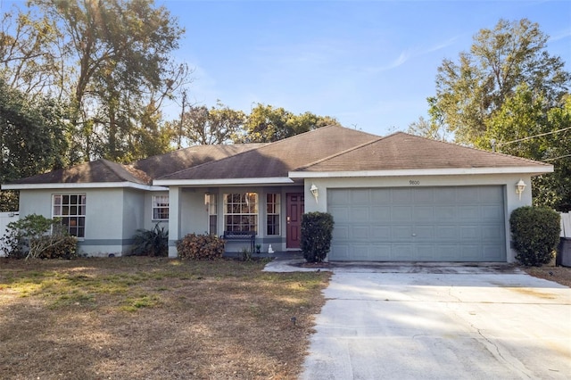 ranch-style home featuring a garage and a porch