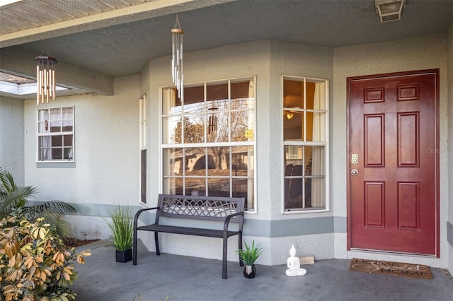 entrance to property with covered porch