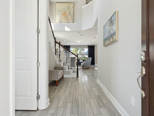 entrance foyer with light wood-type flooring