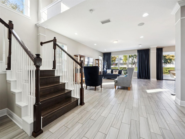 stairs featuring a wealth of natural light