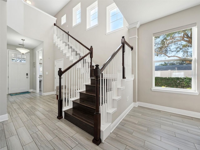 entrance foyer with a towering ceiling