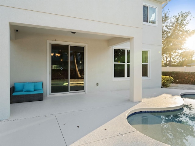 view of swimming pool with a patio