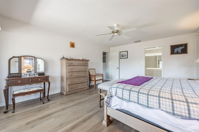 bedroom with ensuite bath, ceiling fan, and light wood-type flooring