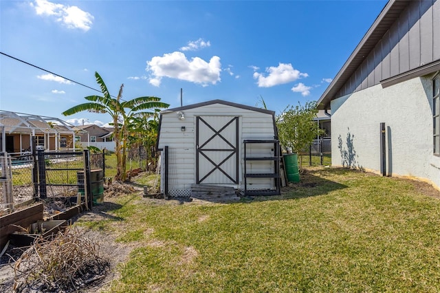 view of outbuilding featuring a lawn