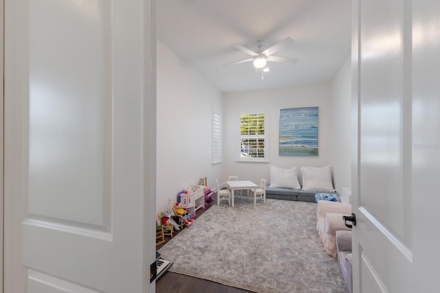 rec room featuring hardwood / wood-style flooring and ceiling fan