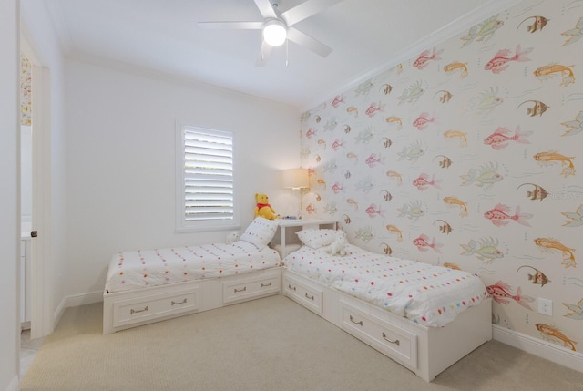 unfurnished bedroom featuring ceiling fan, light colored carpet, and ornamental molding