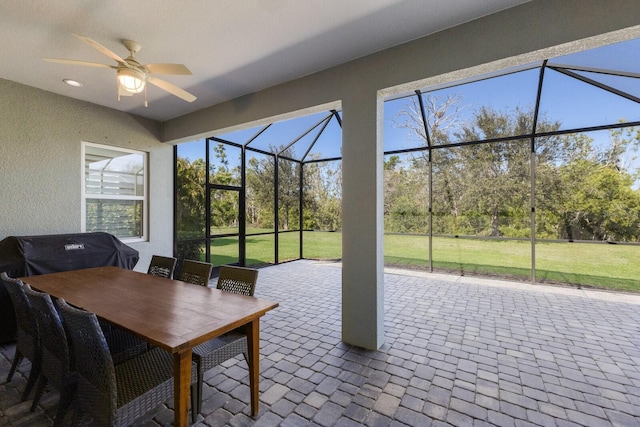 sunroom / solarium with ceiling fan