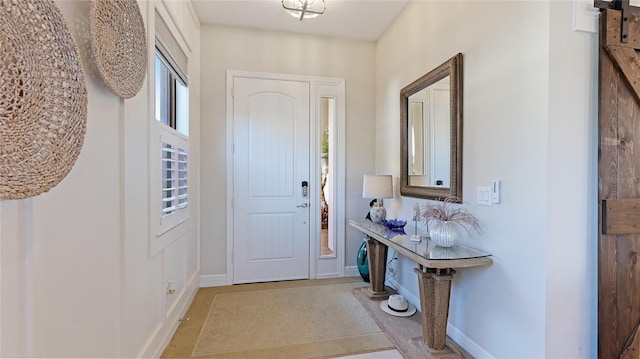 entryway featuring a barn door