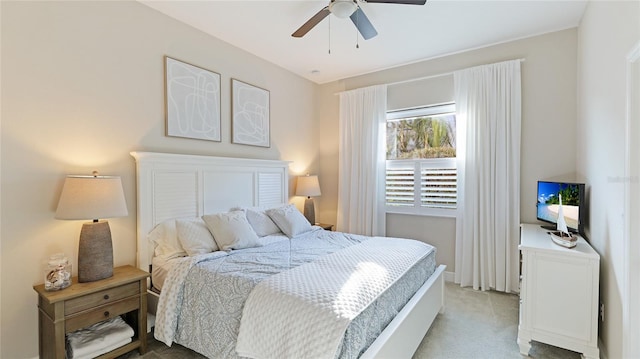 bedroom featuring ceiling fan and carpet floors