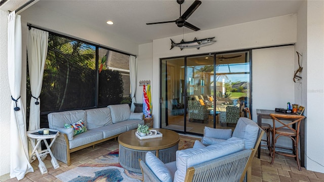 exterior space with ceiling fan and outdoor lounge area