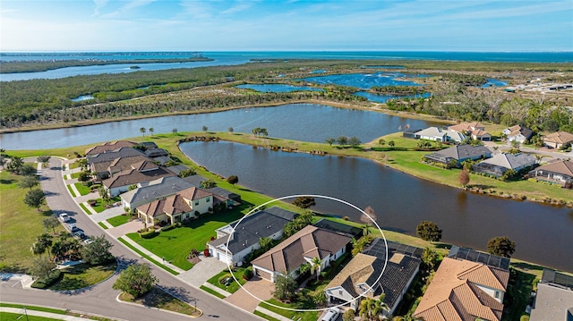 aerial view featuring a water view