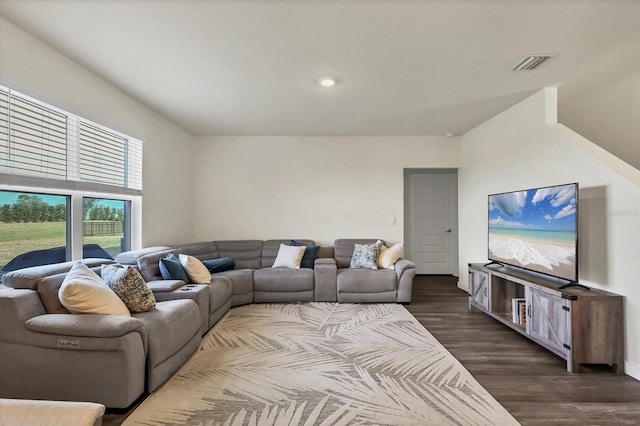 living room with dark hardwood / wood-style floors