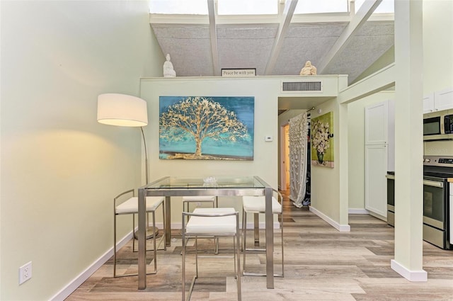 dining area with light wood-type flooring