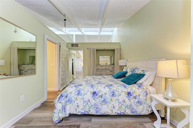 bedroom featuring hardwood / wood-style floors