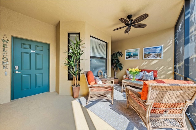 interior space featuring ceiling fan