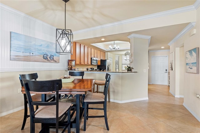 dining space featuring crown molding, light tile patterned flooring, a notable chandelier, and a tray ceiling