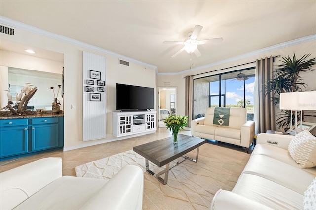 tiled living room with crown molding and ceiling fan