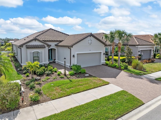 mediterranean / spanish-style home featuring a garage