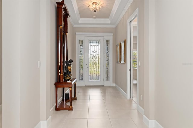 tiled entrance foyer with crown molding