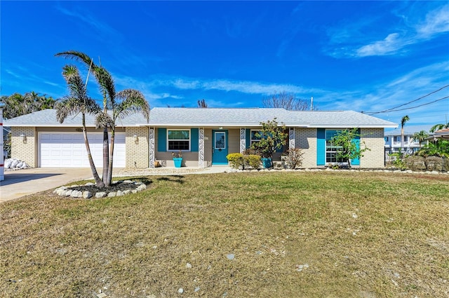 single story home with a front lawn and a garage