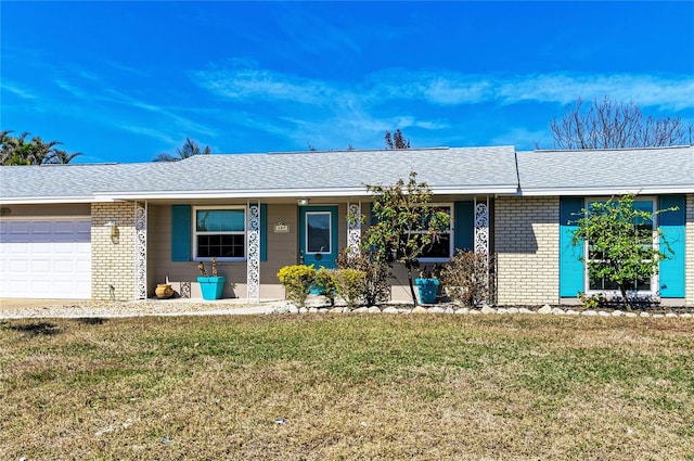 ranch-style house with a front lawn and a garage