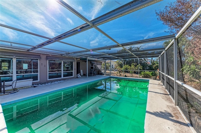 view of pool featuring a lanai