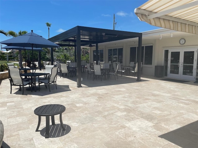 view of patio featuring french doors