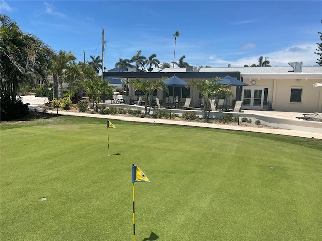 view of property's community with a patio