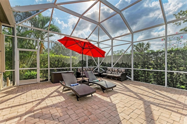 view of patio / terrace featuring a lanai