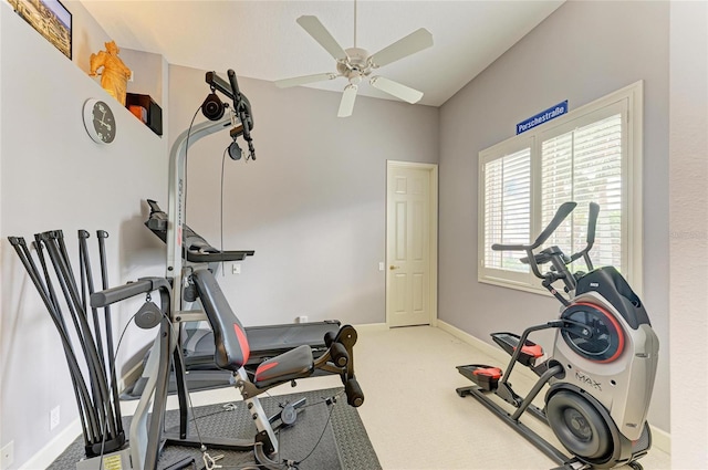 exercise area with ceiling fan and carpet flooring