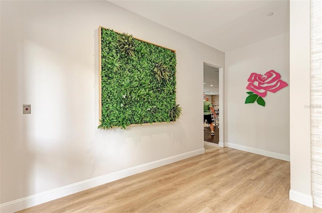 spare room with light wood-type flooring