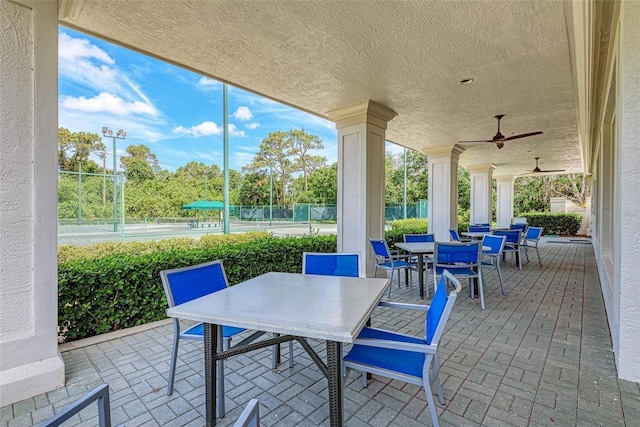 view of patio / terrace featuring ceiling fan