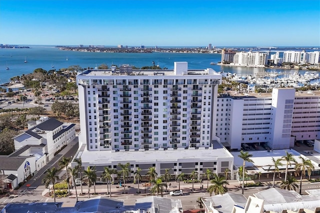 birds eye view of property with a water view