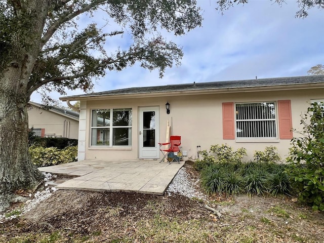 rear view of property with a patio area