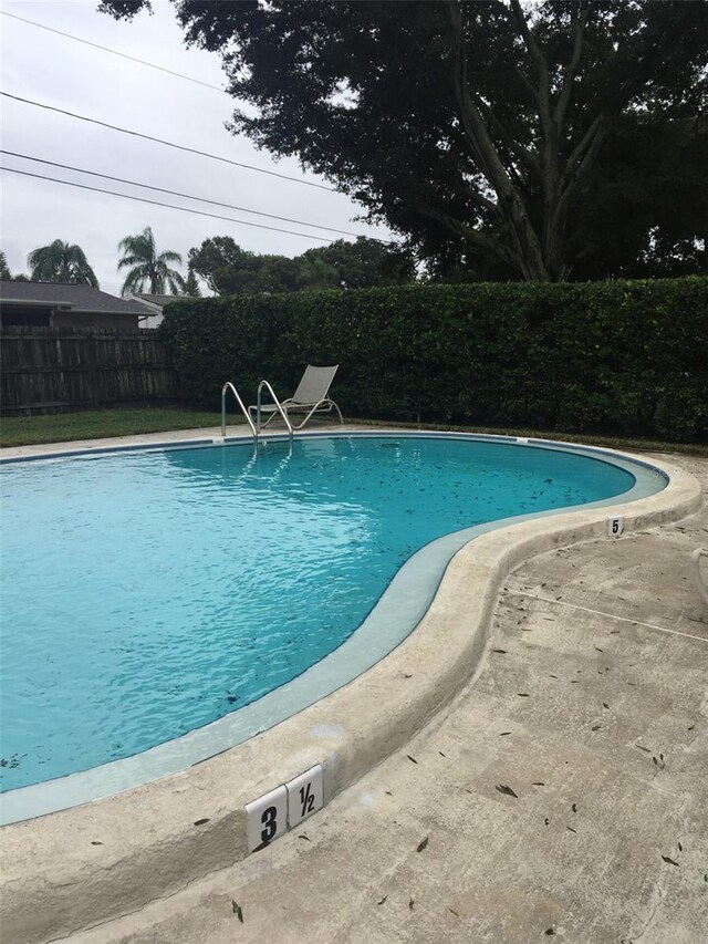 view of pool with a patio