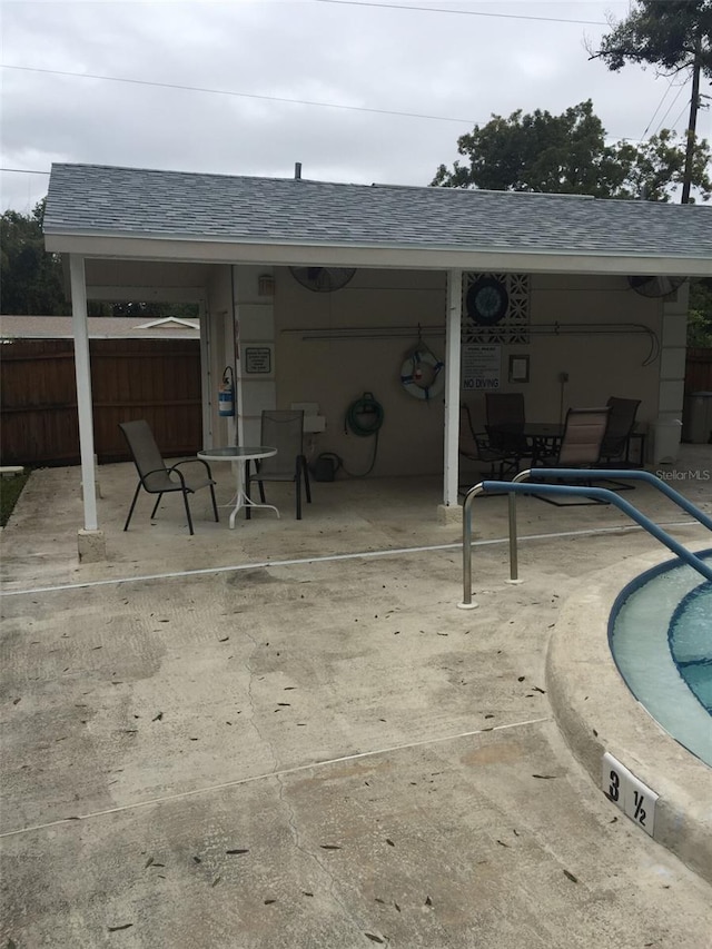 view of patio with a pool