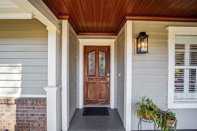 property entrance featuring covered porch