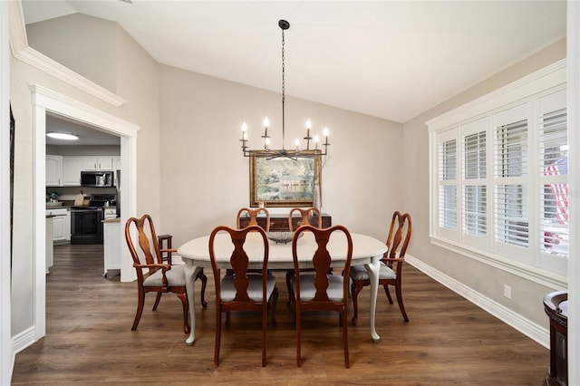 dining area featuring dark wood-style floors, a notable chandelier, vaulted ceiling, and baseboards