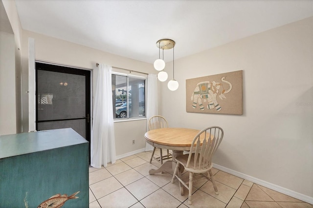 dining room with light tile patterned flooring