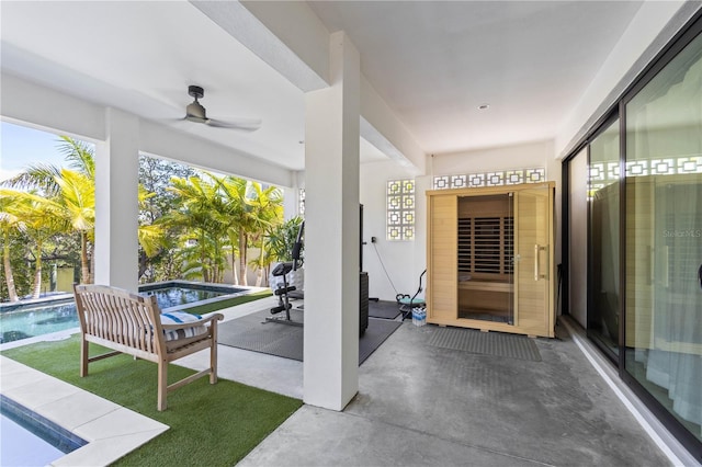 view of patio featuring ceiling fan