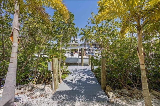 view of front of house featuring a boat dock