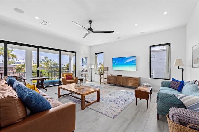 living room with ceiling fan