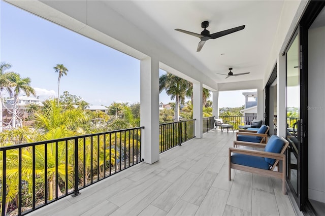 wooden deck with ceiling fan