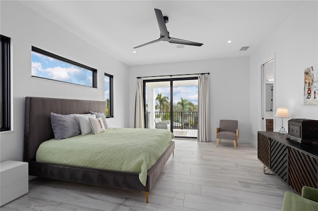 bedroom featuring light hardwood / wood-style flooring, access to outside, and ceiling fan