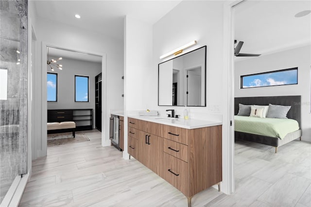 bathroom with vanity and a healthy amount of sunlight