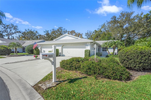 single story home featuring a garage