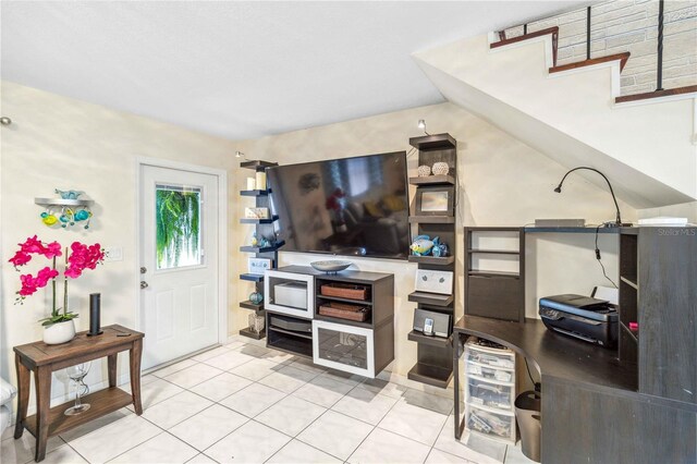 tiled living room with vaulted ceiling