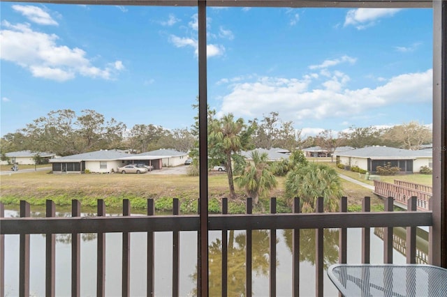 exterior space with a water view